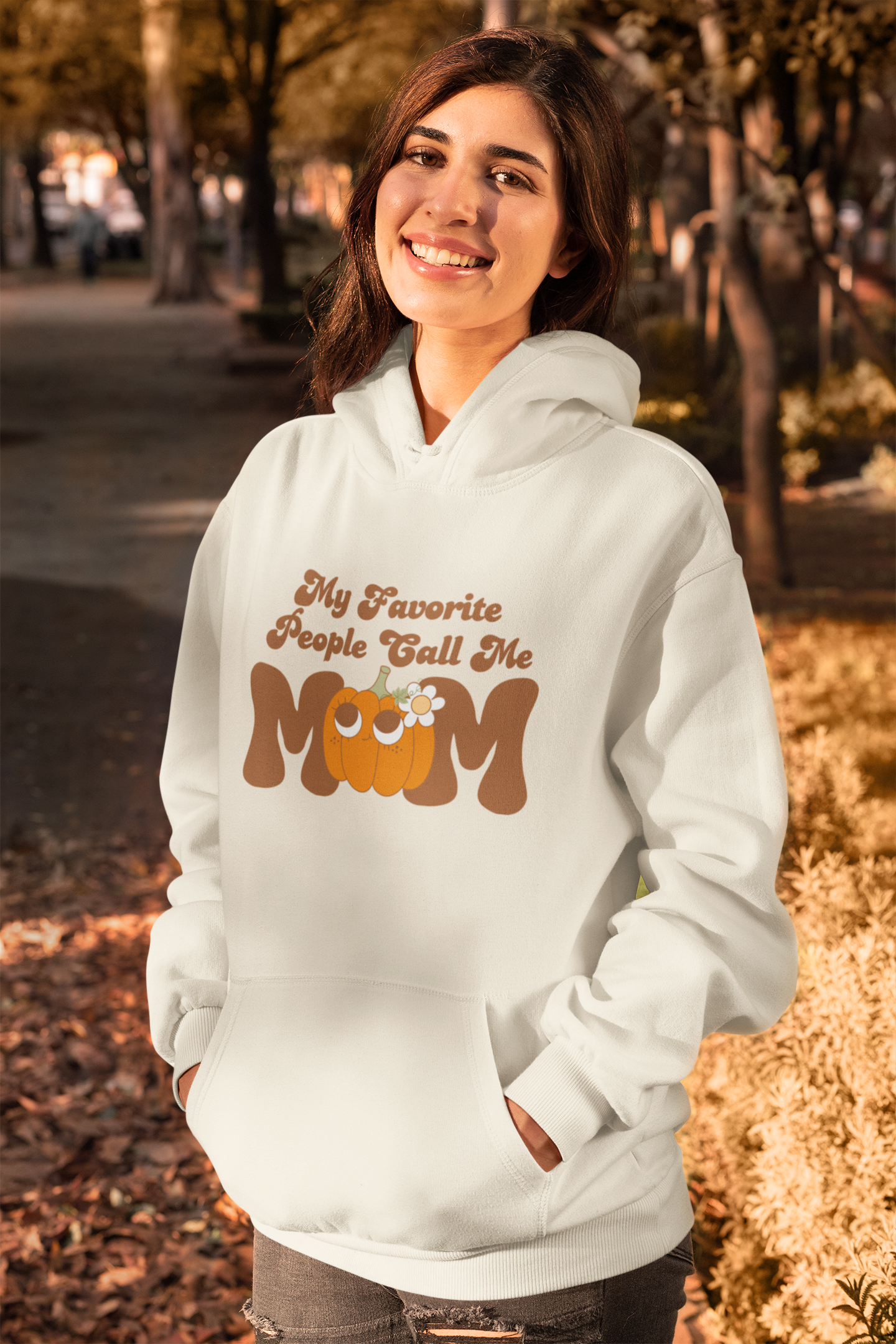 One of many seasonal hoodies from our fall Picks collection. A beige base with my favorite People Call me MOM printed in brown retro font with an adorable pumpkin as the O in MOM