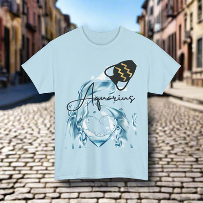 Black pot with gold Aquarius Symbol lines pouring water that splashes around into a heart. Aquarius printed in black handwritten font- light blue shirt