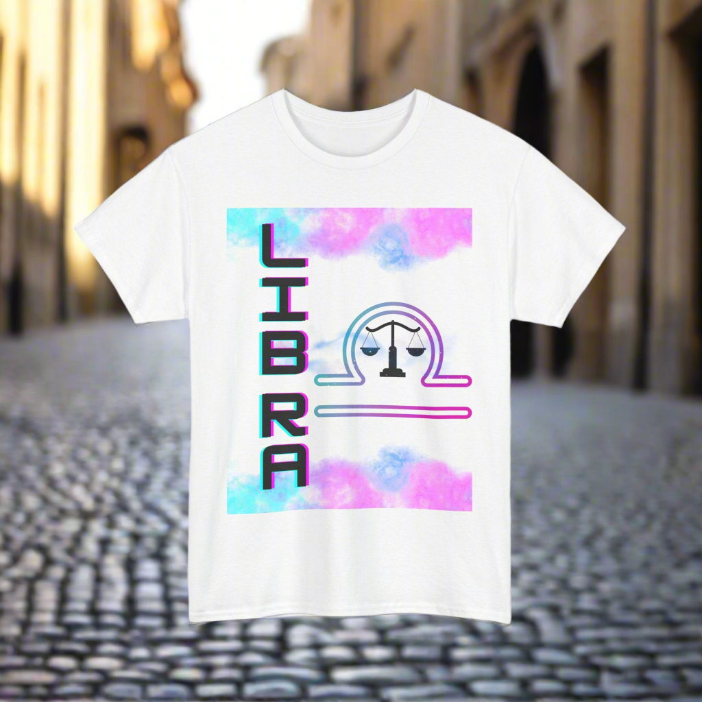 Watercolor white, pink, blue, mixed together at the top and bottom of design.  On the left. Side the word lines is printed vertically in digital font with the Libra symbol to the right. White shirt