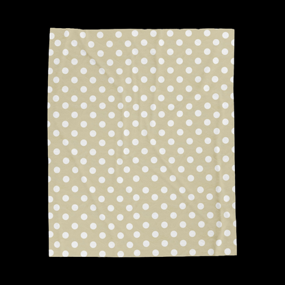 Beige blanket with white polka dots. Neutral design, versatile enough for any room decor or color scheme.  50in x 60in velveteen Plush blanket