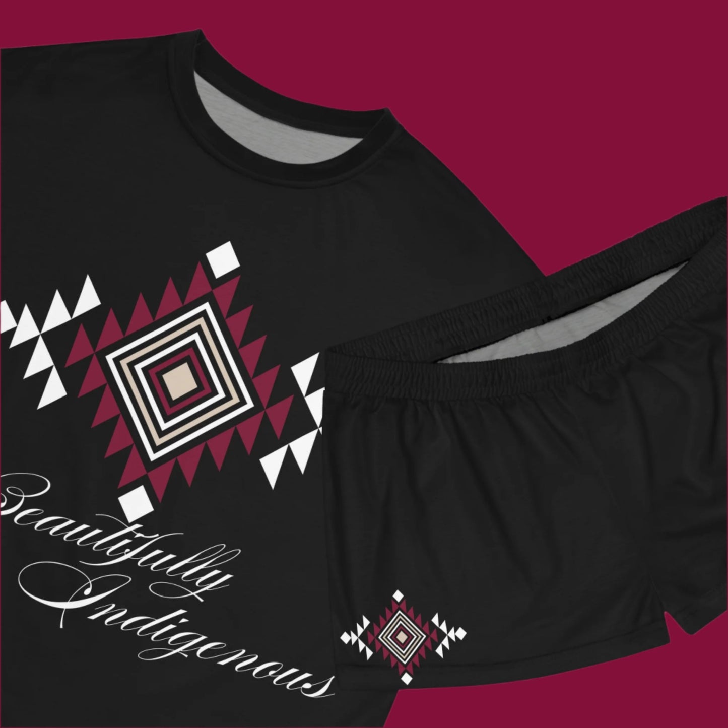 Beautifully Indigenous printed in bold cursive font. a beautiful tribal pattern printed in beige, white, and burgundy. The tribal pattern in also printed on both legs of the shorts