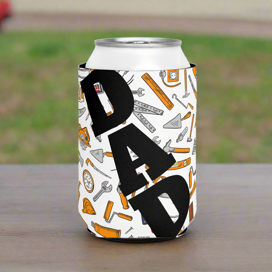 White beer can cooler sleeve with a tool themed background- black DAD printed on one side. Dad works hard he deserves a beer printed on the other side. Perfect gift for father's day