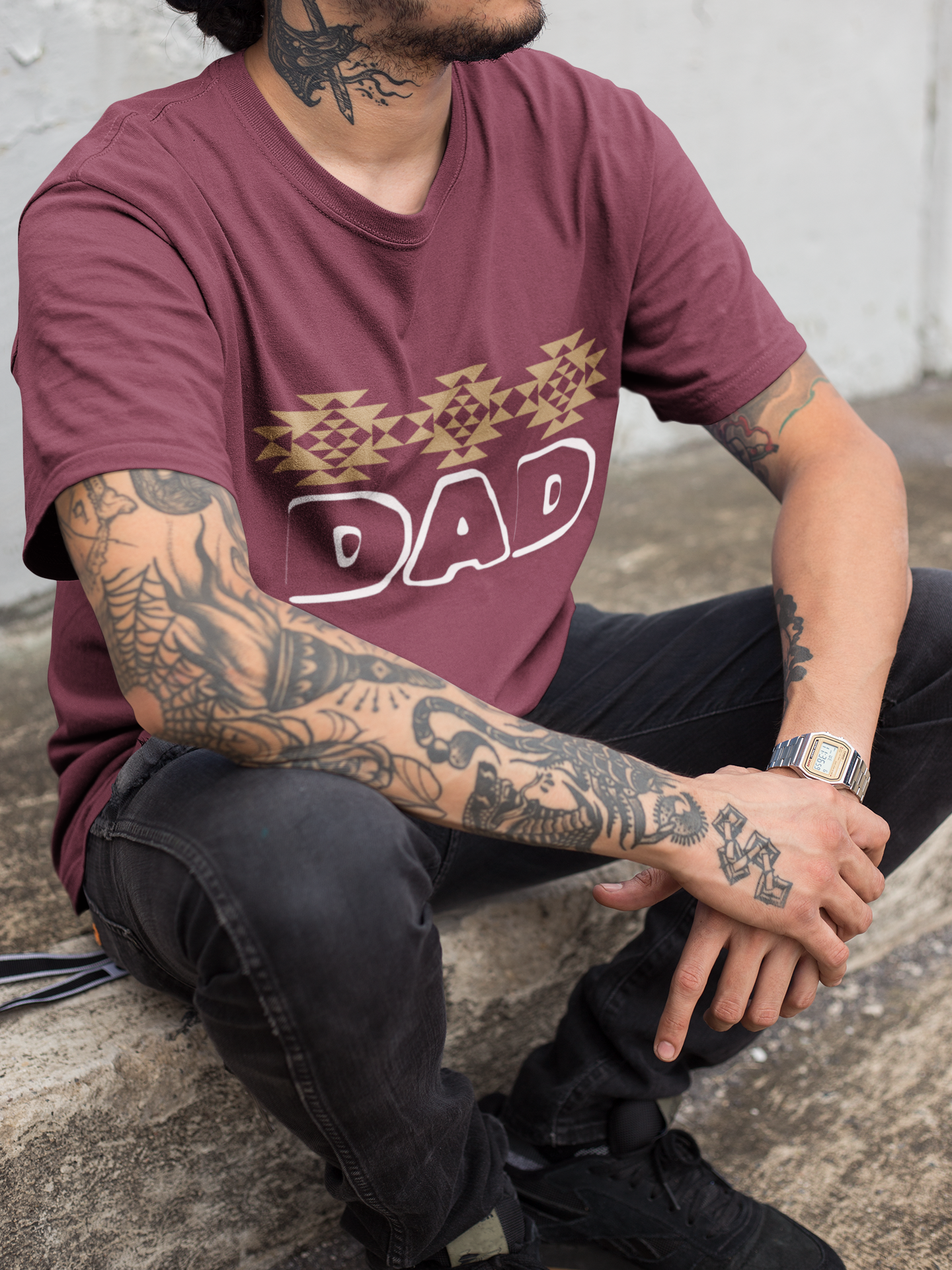 Tribal print across chest with large hollow DAD font in white underneath - maroon