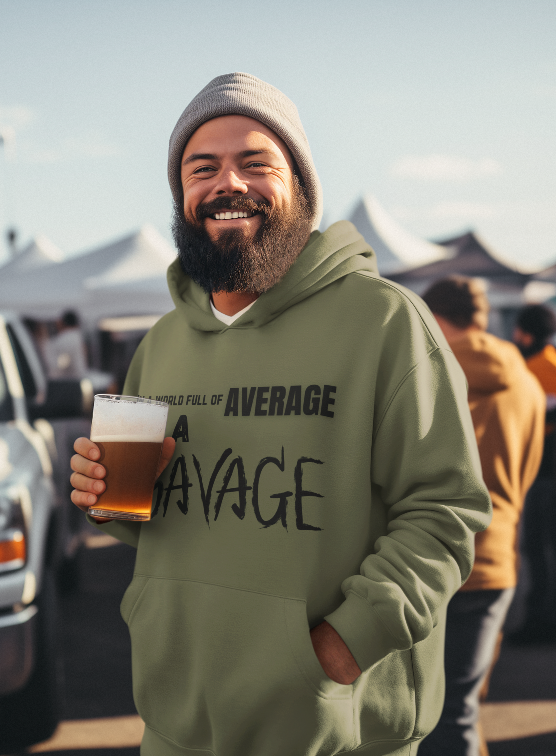 In a world full of average be a Savage. Printed on a soft, breathable hoodie. The top font is standard, average is gold, be a is bolder, and SAVAGE is in a scratched looking font. Military Green