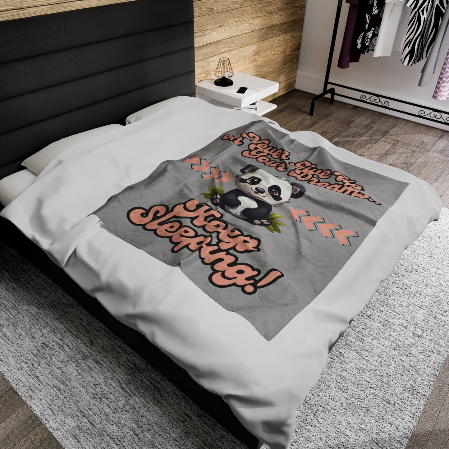 This adorable panda in the center of this grey blanket has a fun retro font printed above saying Never Give Up On Your Dreams above and Keep Sleeping below. 