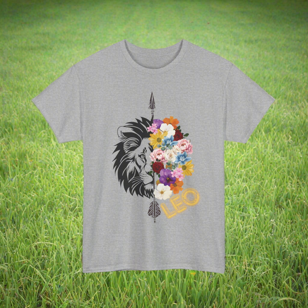 Leo Horoscope Tshirt. Half of a lions face cut down the middle by an arrow. The other half is a beautiful assortment of multicolored flowers with Leo printed in the corner in neon lit yellow font, printed on a sport grey shirt.