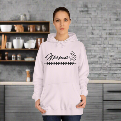 Mama Hoodie - Tribal Print - Woman standing in light pink hoodie with tribal print across the chest. Mama printed in Cursive Font with a silhouette of a mother and baby