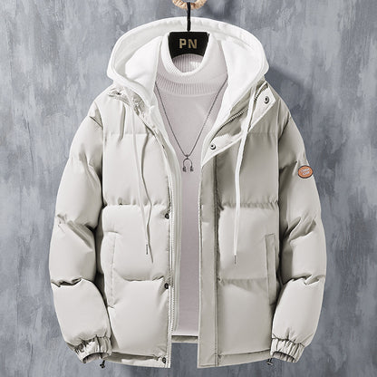 Step up your outerwear game with this Men's Hooded Jacket - Double Layer design with a slight puffer style look/ Adjustable hood  with a drawstring bottom to create that perfect customized fit just for you. Available in Black and Khaki- Pictured Khaki