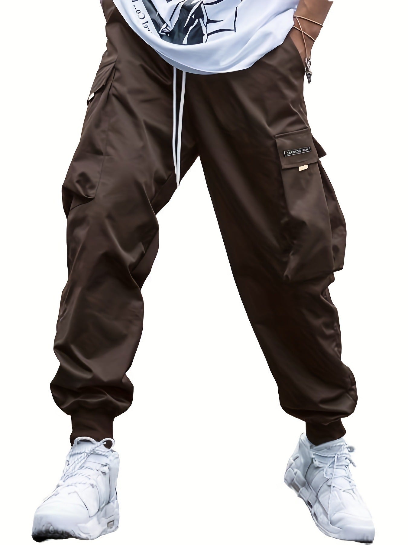 Make an absolute statement and elevate your streetwear game with these Oversized Men's Cargo Pants. The pockets are functional, and the oversized design delivers complete comfort. Versatile enough to be dressed up or down. - coffee