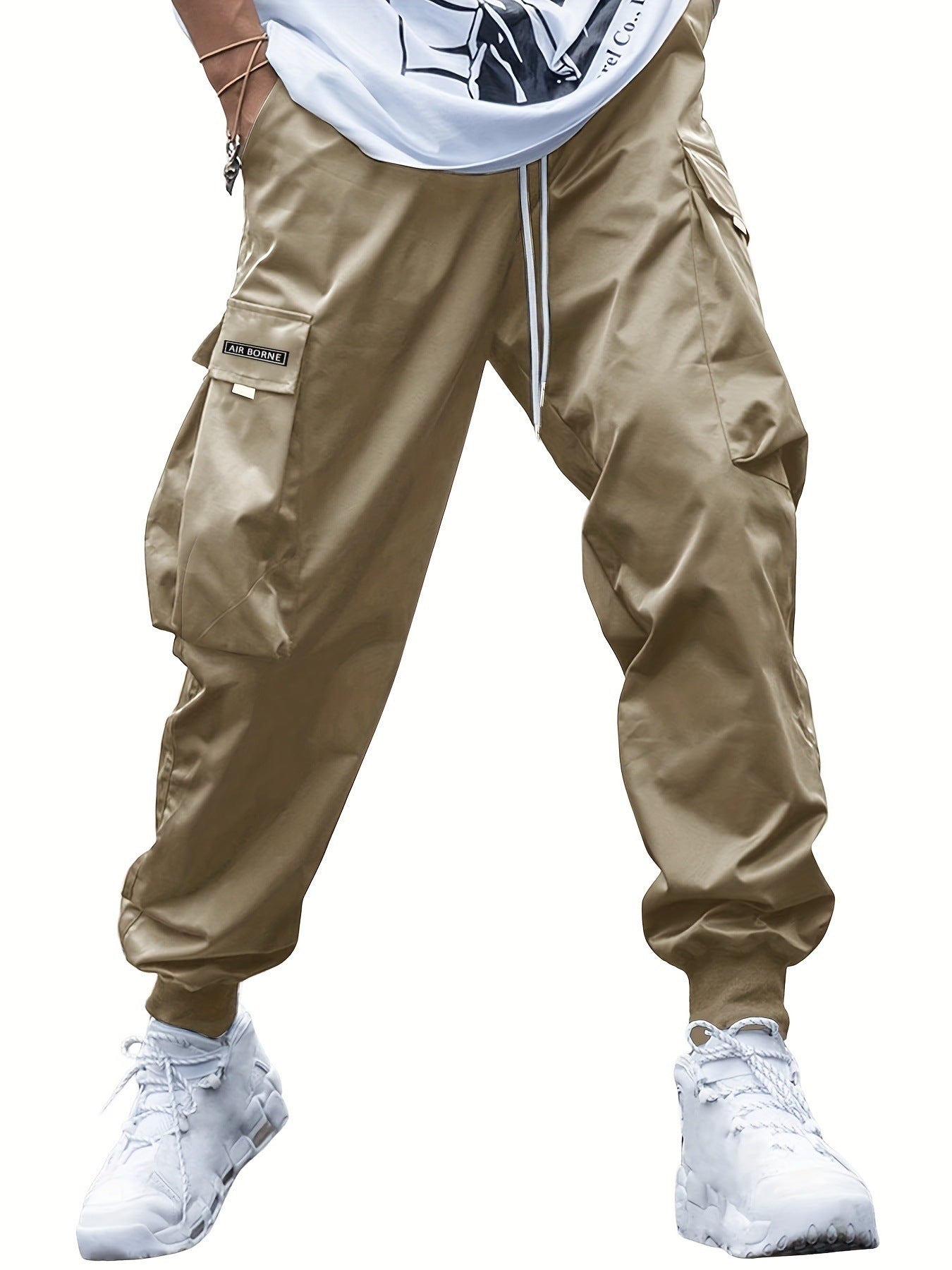 Make an absolute statement and elevate your streetwear game with these Oversized Men's Cargo Pants. The pockets are functional, and the oversized design delivers complete comfort. Versatile enough to be dressed up or down. - khaki