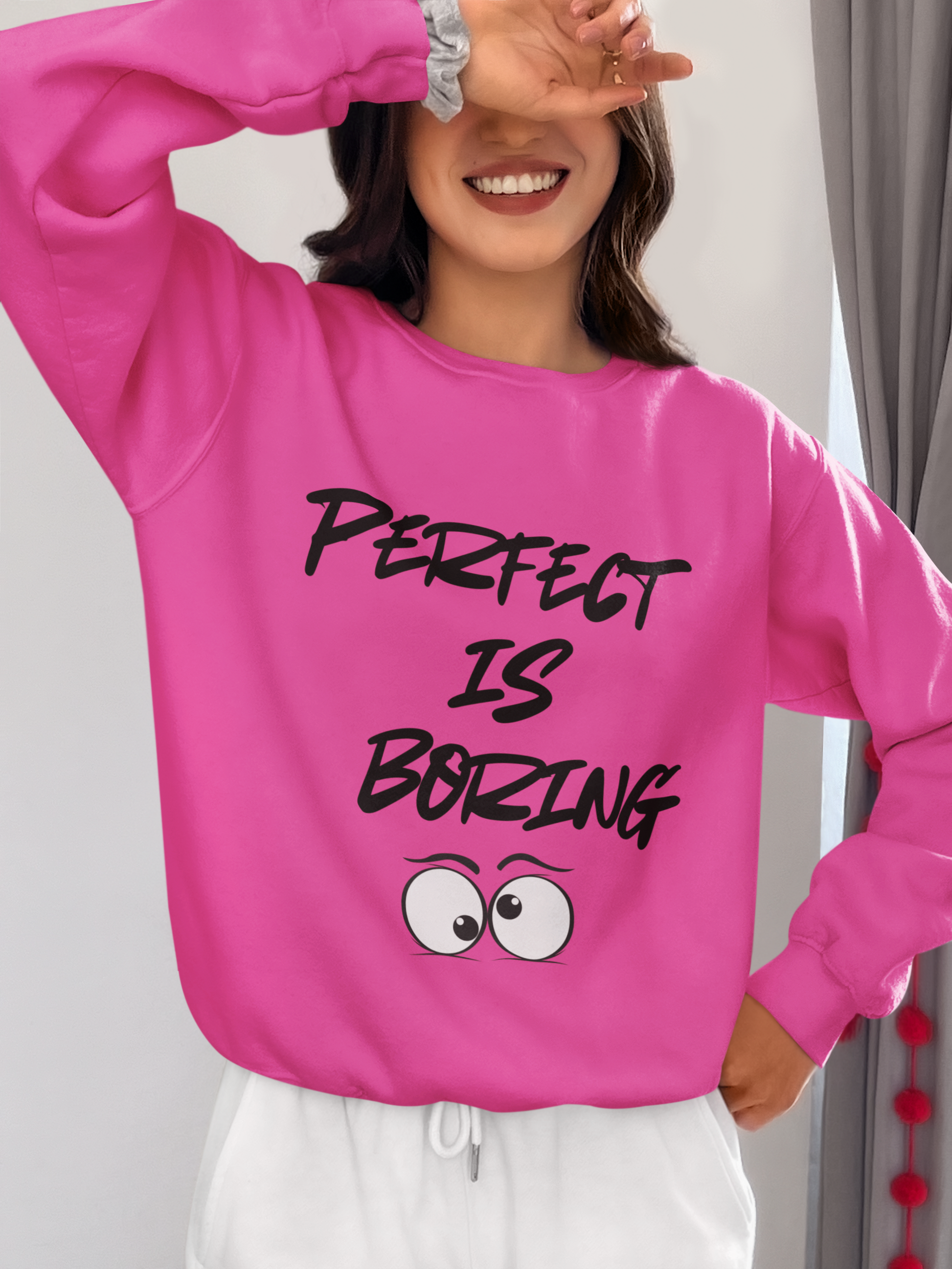 Embrace the individuality that only you have to offer! Our Perfect is Boring Crewneck Sweatshirt features that saying on the front with goofy eyes underneath and on the back is printed with a kiss mark xoxo - The Hot Mess Express - Pink Lemonade