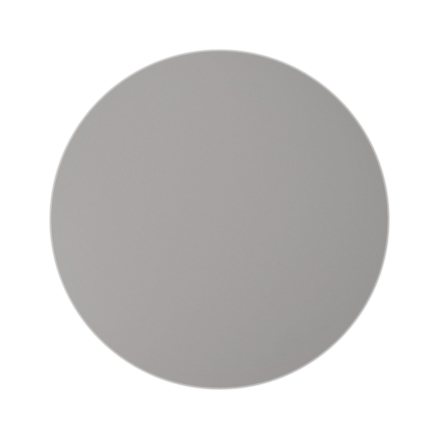 neutral colored round area rug with a cream tan colored base with white circles and black abstract lines