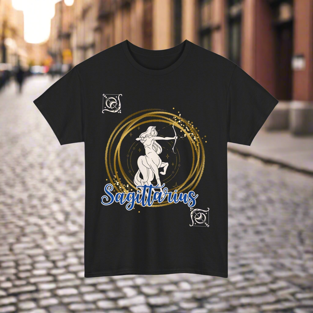 Sagittarius Horoscope tshirt with the Sagittarius symbol in white with gold stacked rings circling it. Smaller white arrows in diagonal corners with Sagittarius printed in blue cursive lettering with white outline - black shirt