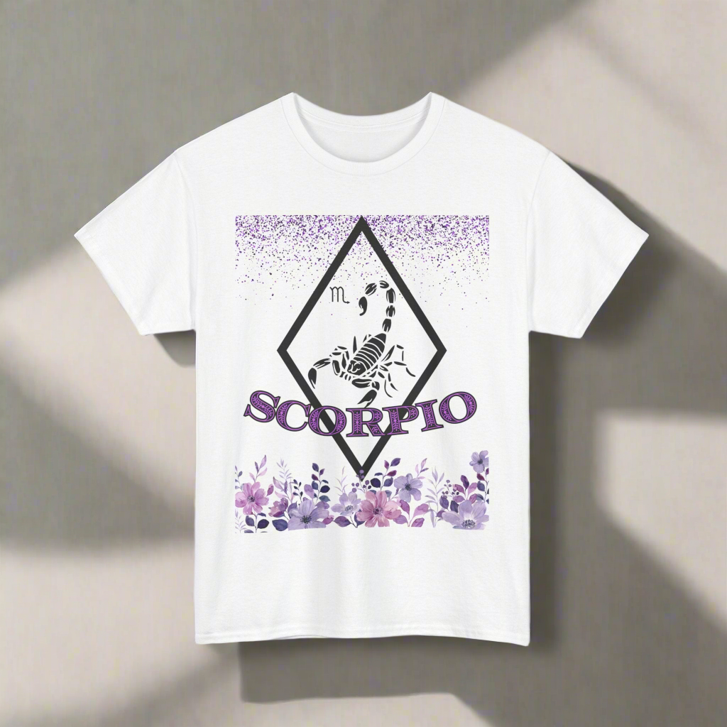 Scorpio Horoscope tshirt with falling purple glitter, a hollow white diamond with a white scorpion in the center. Scorpio printed in purple font with white outline over more fading purple glitter - white shirt 