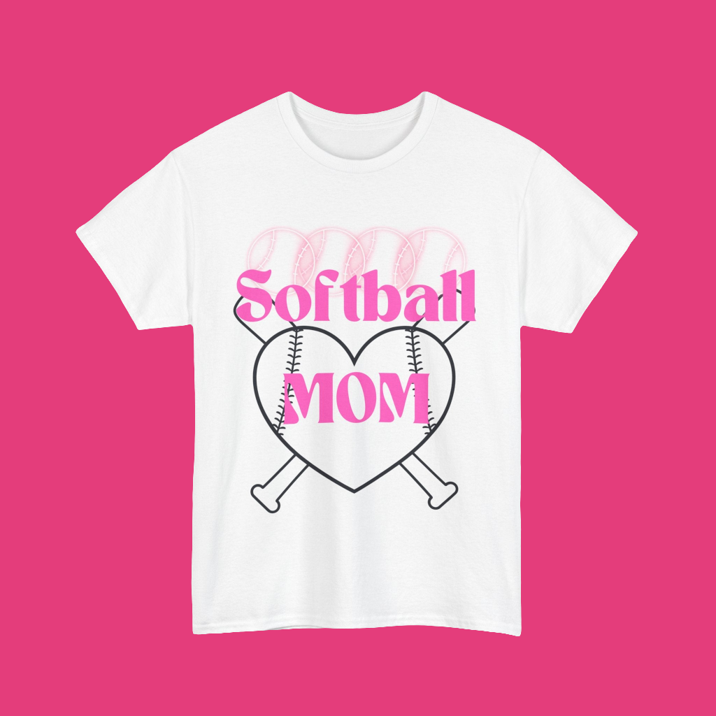 Softball Mom tshirt- four neon pink softballs across the top Softball MOM in the center in a bright pink retro font with two black outline baseball bats and a heart with thread lines In the background - white