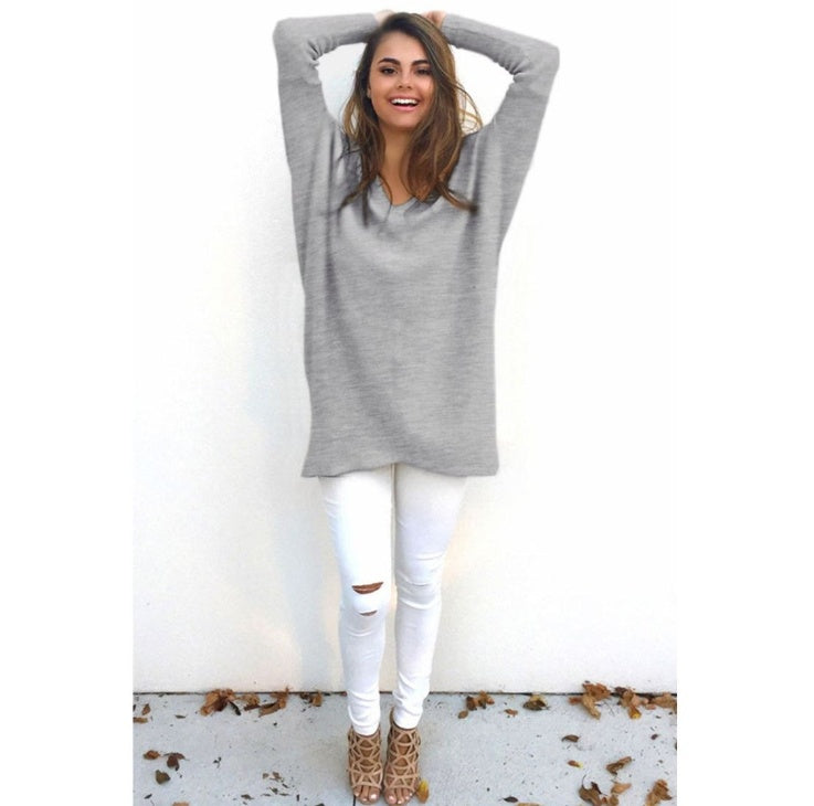 absolute style and comfort is what the vneck oversized womens sweater is giving The oversized look gives a casual style while the vneck provides a level of elegance. - grey