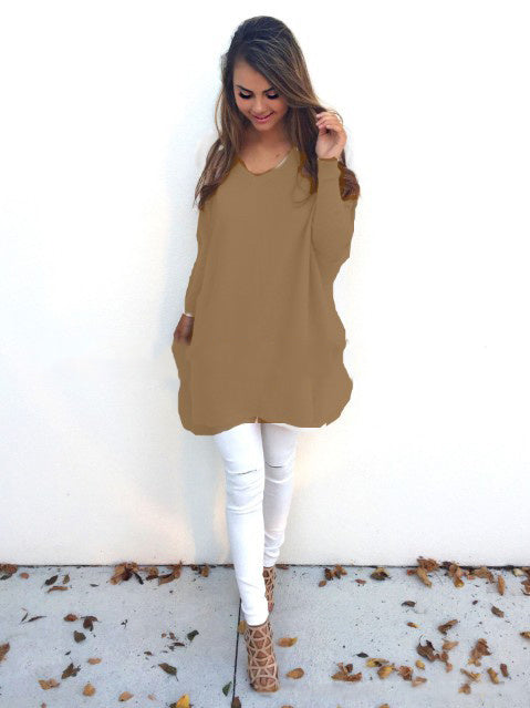 absolute style and comfort is what the vneck oversized womens sweater is giving The oversized look gives a casual style while the vneck provides a level of elegance. - khaki