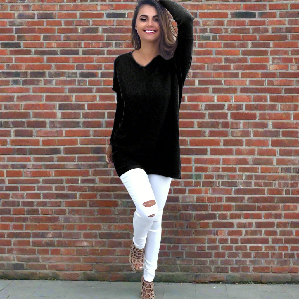 absolute style and comfort is what the vneck oversized womens sweater is giving The oversized look gives a casual style while the vneck provides a level of elegance. - black