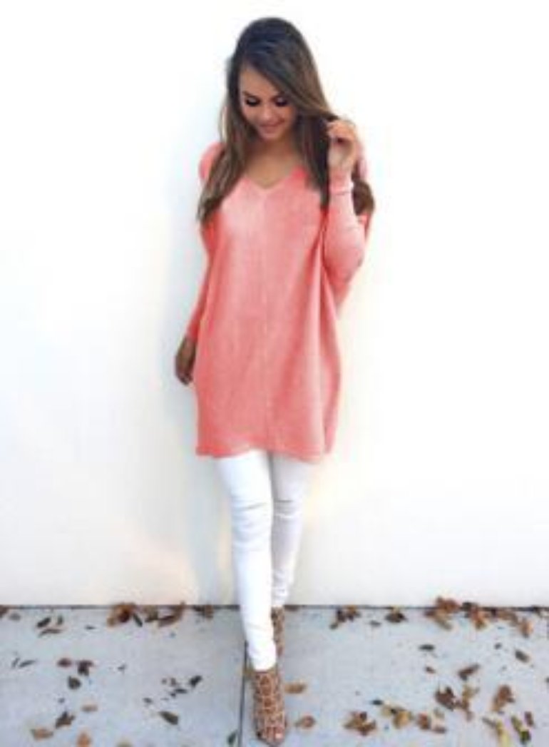 absolute style and comfort is what the vneck oversized womens sweater is giving The oversized look gives a casual style while the vneck provides a level of elegance. - pink