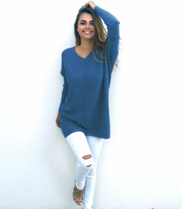 absolute style and comfort is what the vneck oversized womens sweater is giving The oversized look gives a casual style while the vneck provides a level of elegance. - blue