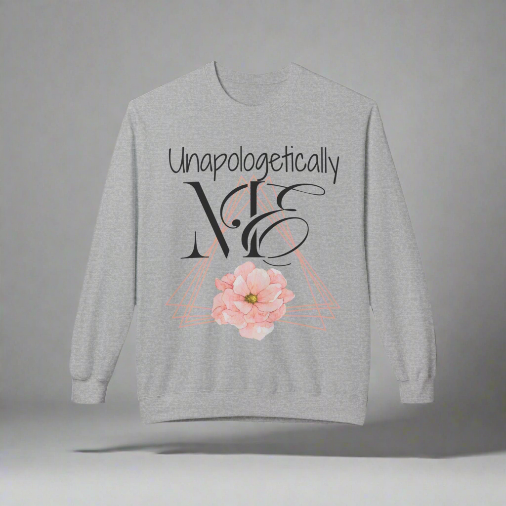 Pink triangle outlines stacked at different angkes with a beautiful pink flower on the bottom center. Unapologetically written in handwritten type font. ME written in half proper half cursive font with the E wrapping around the M. Elegance, Confidence, and fun all wrapped up into one beautiful crewneck. - ash grey